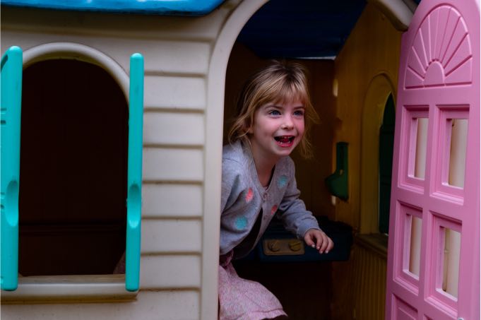 Child playing in cubby house during Speech Pathology at Voice Within Therapy Centre